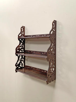 Openwork wall shelves
