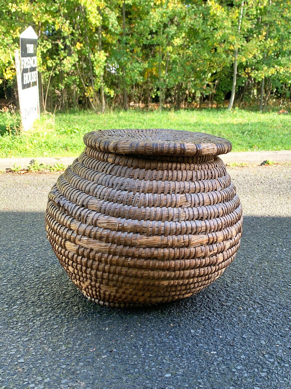 Lidded rattan storage container
