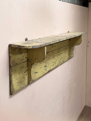 Painted shelf with hooks