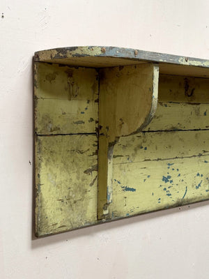 Painted shelf with hooks