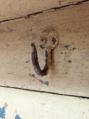 Painted shelf with hooks