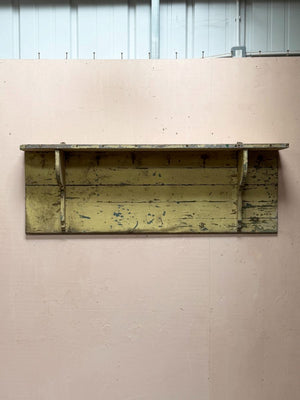 Painted shelf with hooks