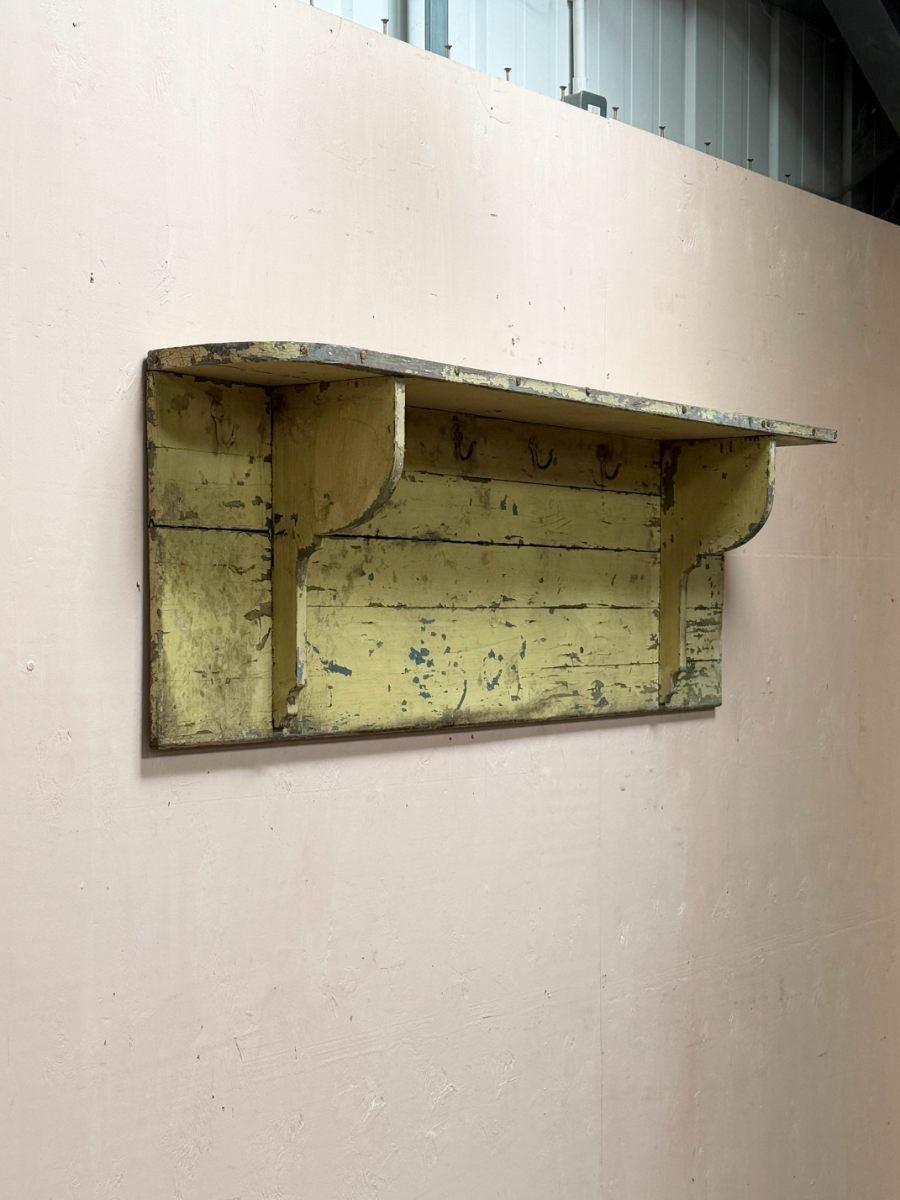 Painted shelf with hooks