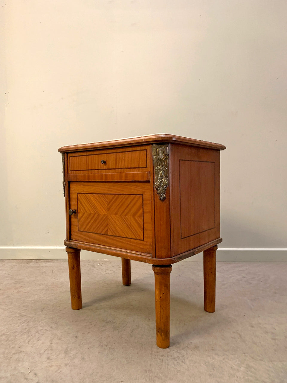Squat cupboard with marble top