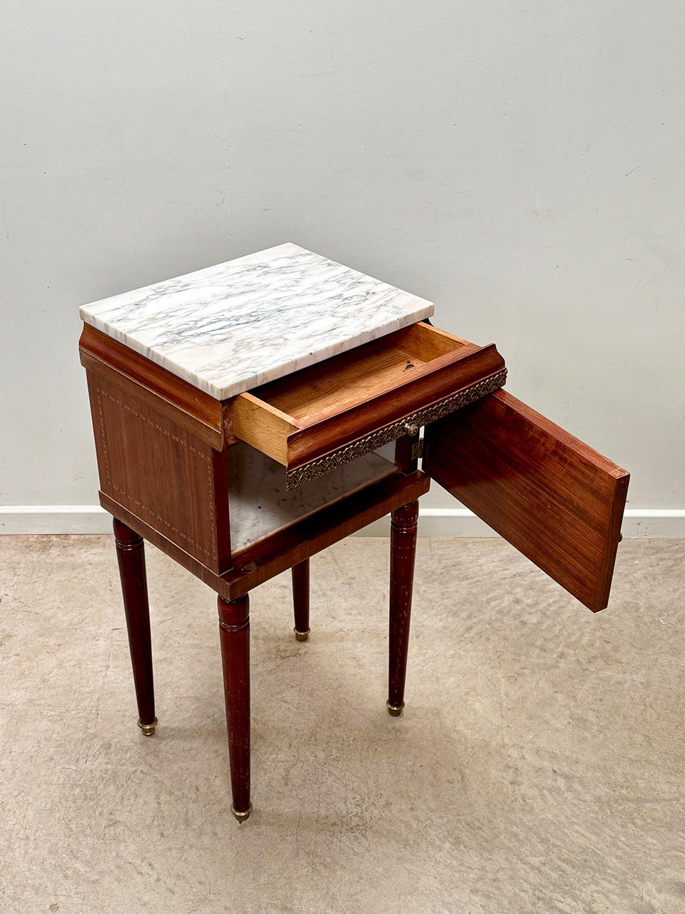 Tall marble top bedside