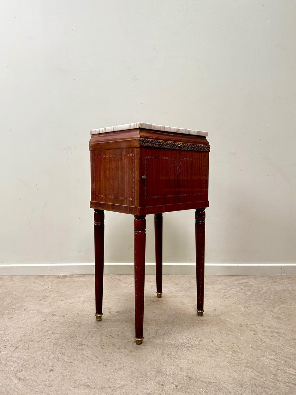 Tall marble top bedside