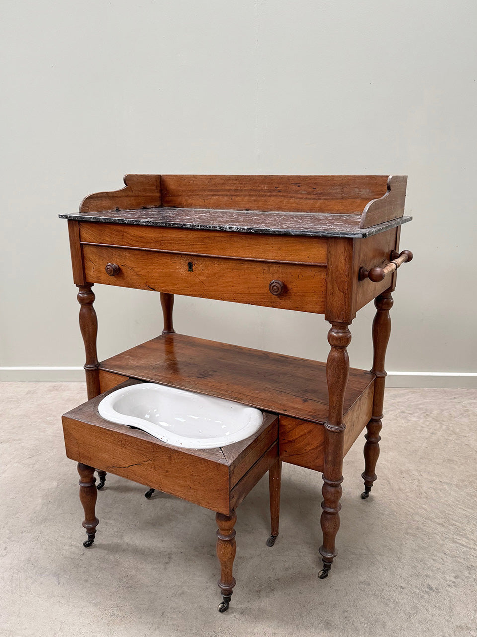 Marble top washstand with bidet