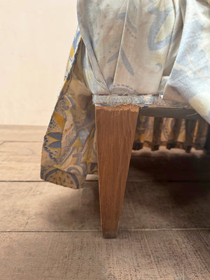 Buttoned back slipper chair