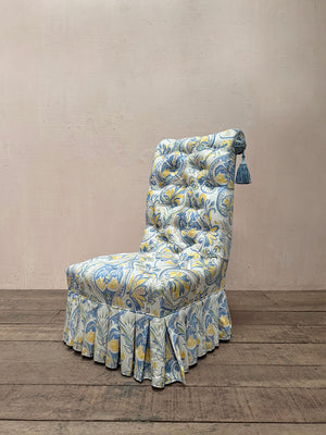 Buttoned back slipper chair