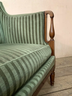 Green striped sofa