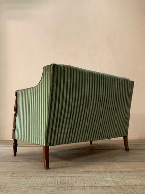 Green striped sofa