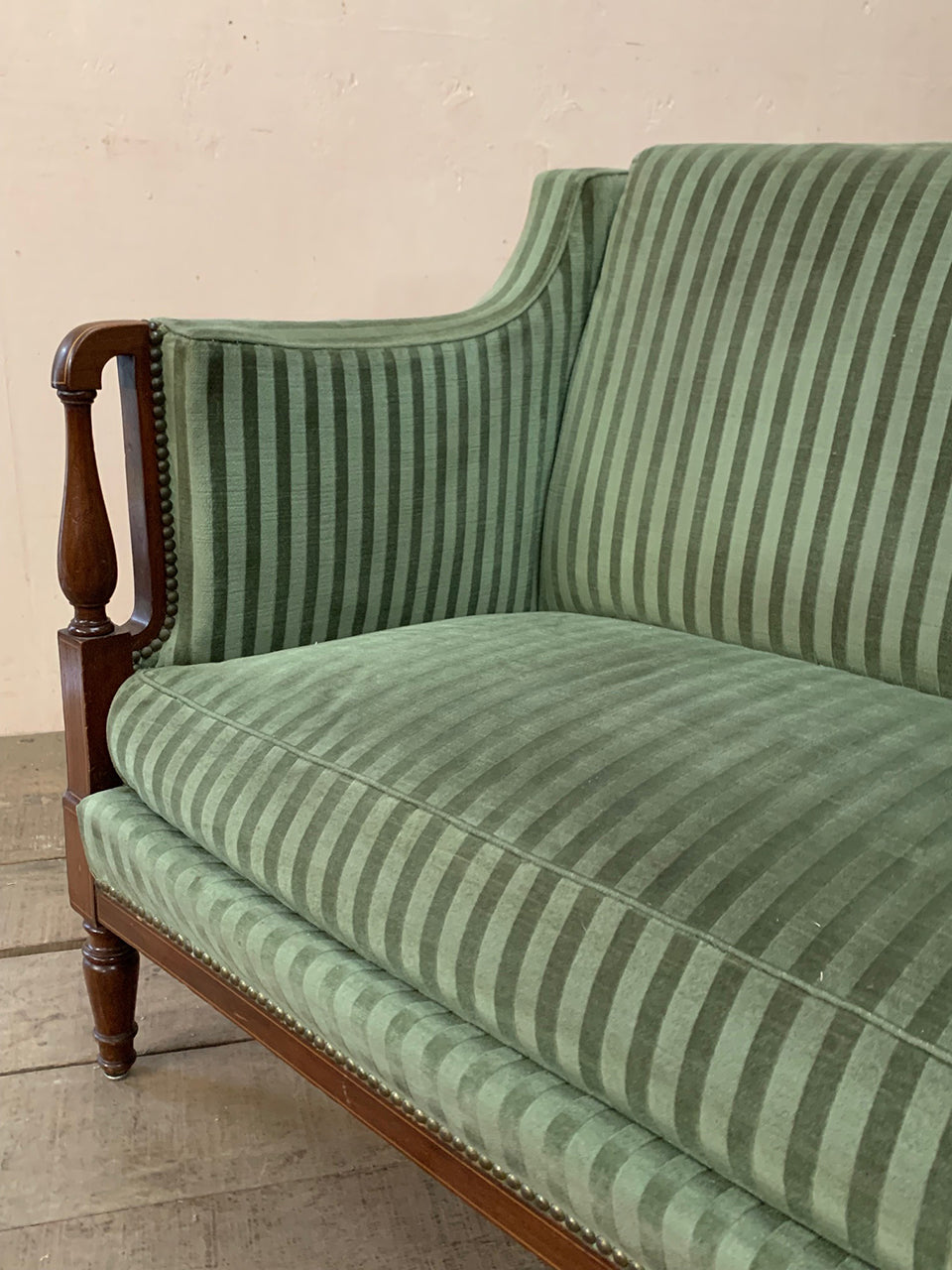 Green striped sofa