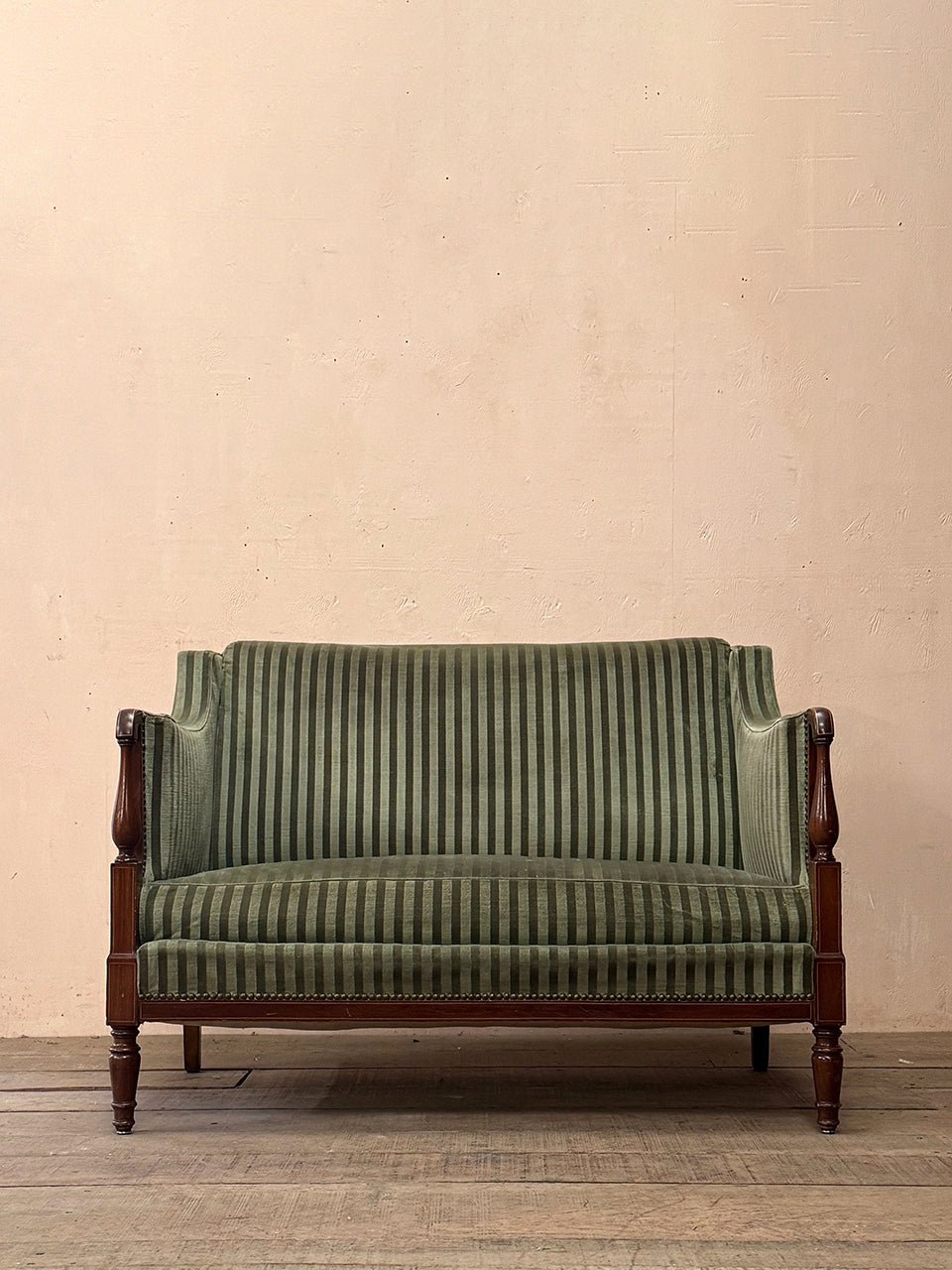 Green striped sofa