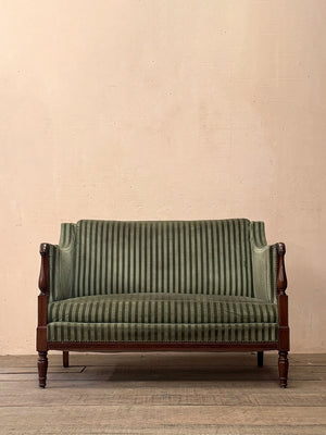 Green striped sofa