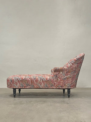 Chaise longue with ebonised legs