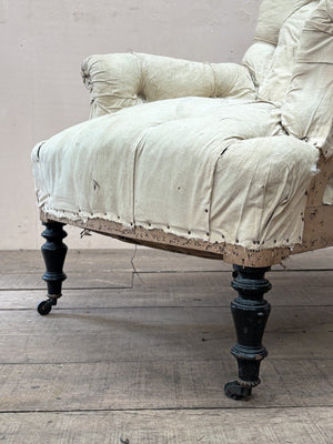 Deep buttoned armchair