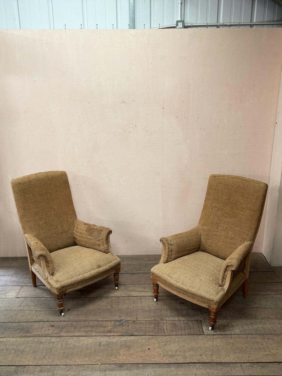 Pair of high back armchairs