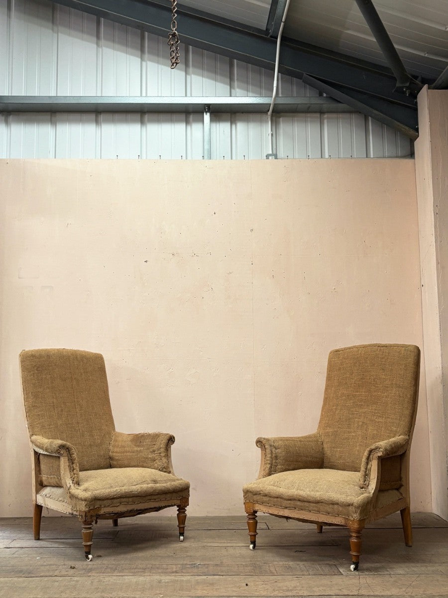 Pair of high back armchairs