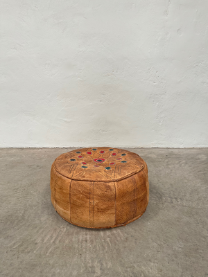 Leather covered pouffes (Small: £85 Large: £140)