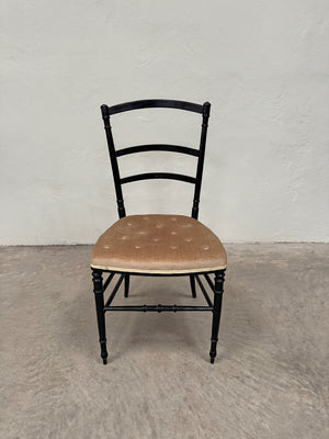 Set of ebonised dining chairs