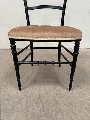 Set of ebonised dining chairs