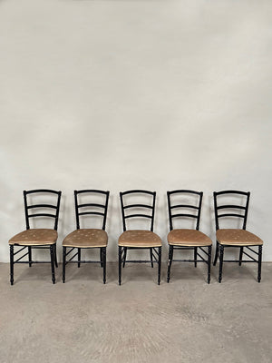 Set of ebonised dining chairs