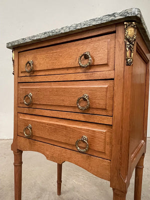 Green marble top chest of drawers