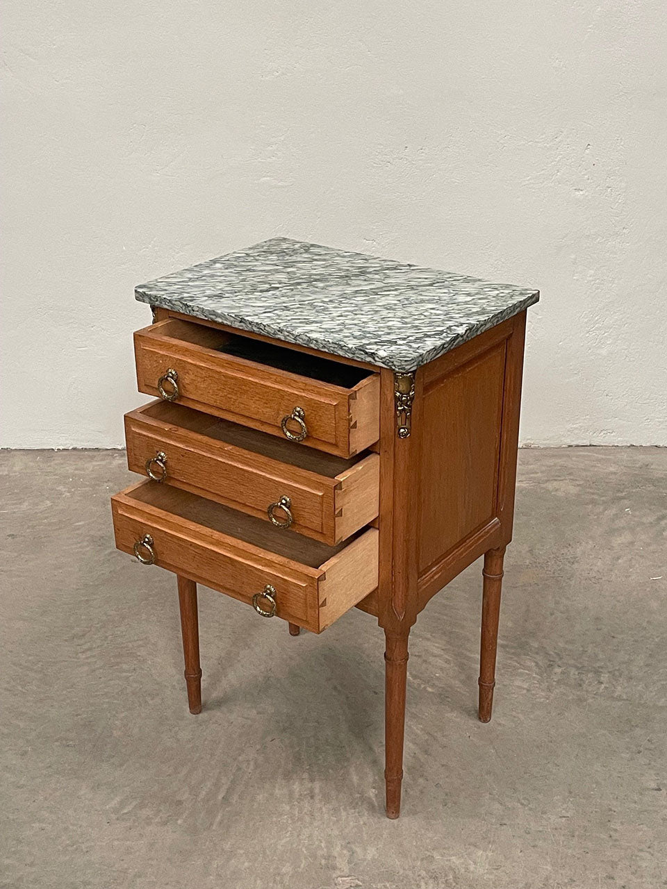 Green marble top chest of drawers