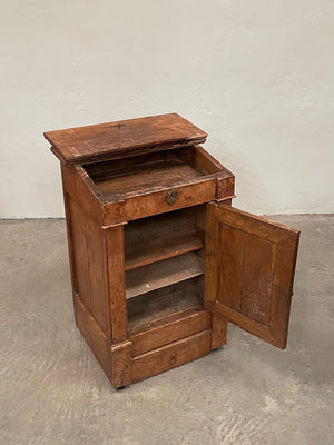 Cabinet with sloping top