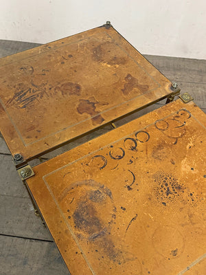 Pair of worn leather top tables