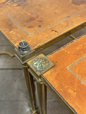 Pair of worn leather top tables