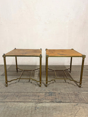 Pair of worn leather top tables