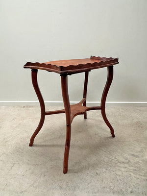 Scalloped side table