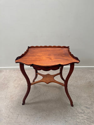 Scalloped side table