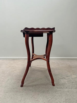 Scalloped side table