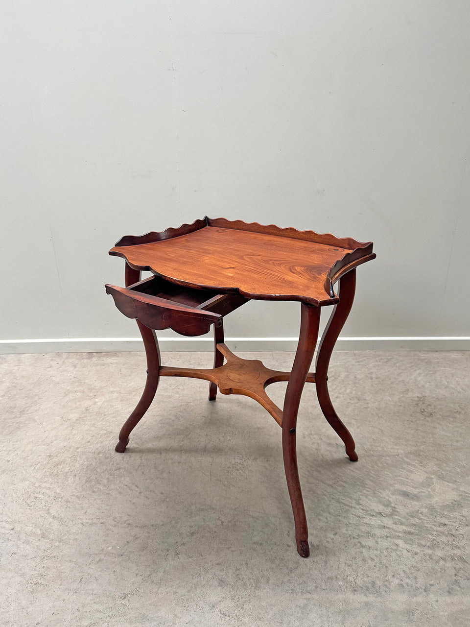 Scalloped side table