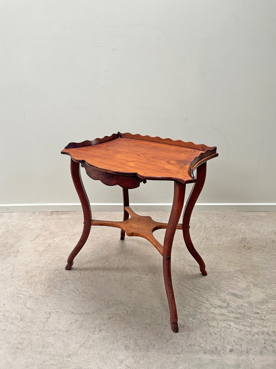 Scalloped side table