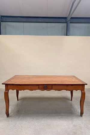 Wide fruitwood dining table