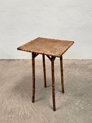 Faux tiger bamboo side table