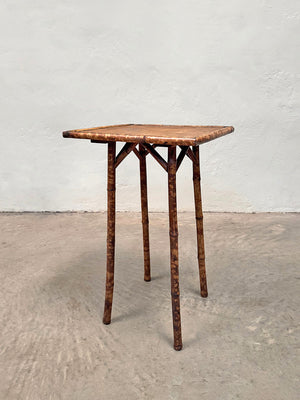 Faux tiger bamboo side table