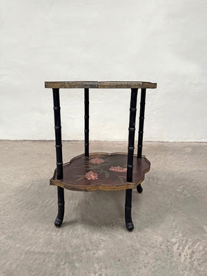 Ebonised and hand painted side table