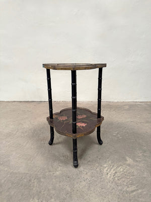 Ebonised and hand painted side table