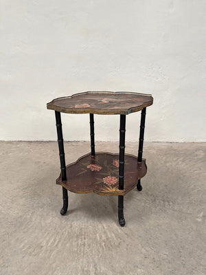 Ebonised and hand painted side table