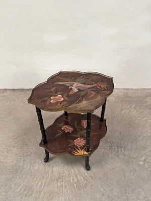 Ebonised and hand painted side table