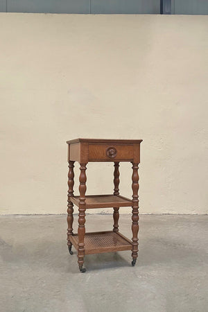 Cane tiered side table with marble top