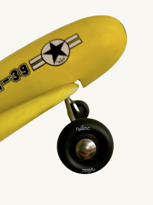 Yellow toy plane by Vilac