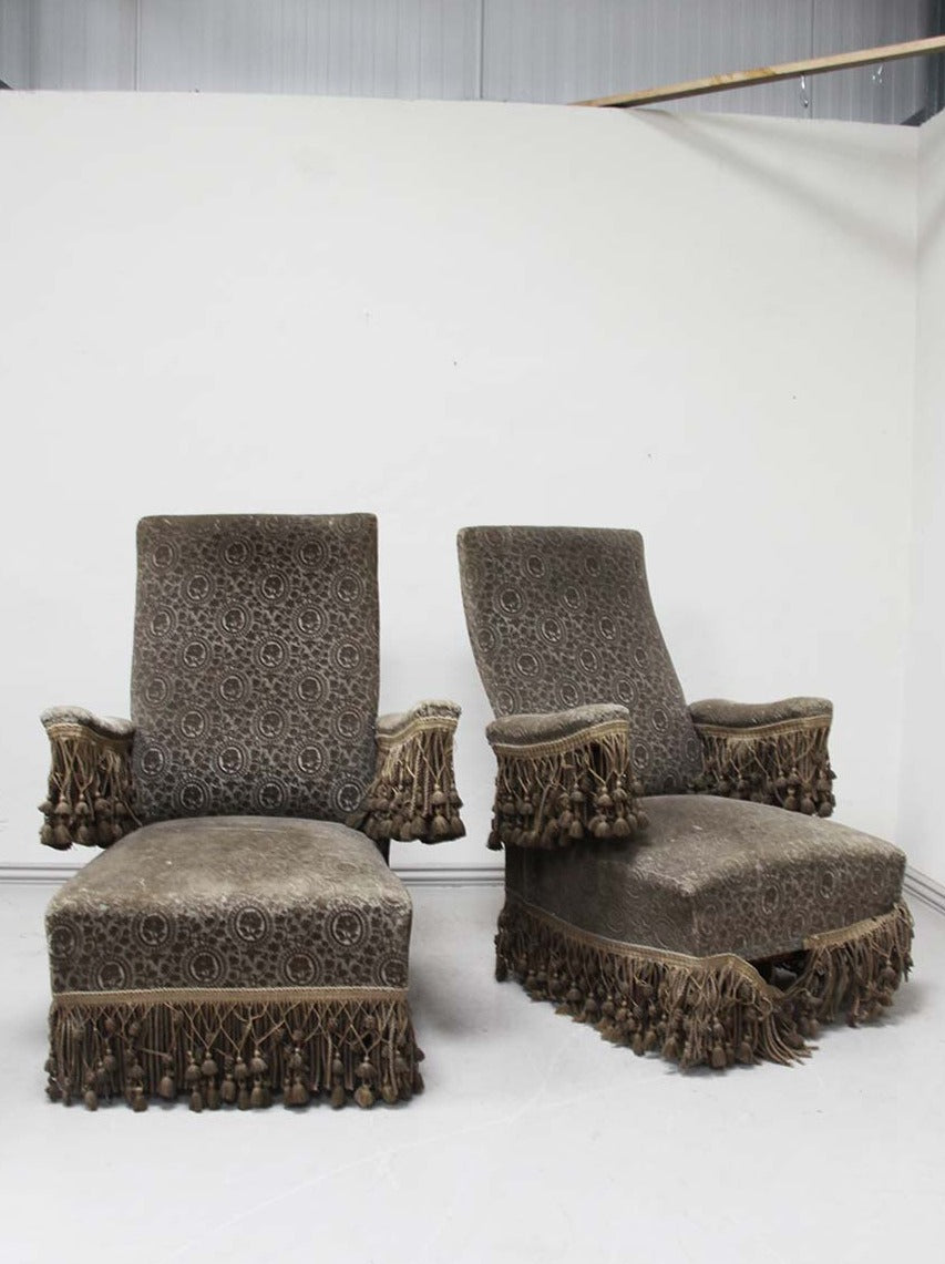 Pair of fringed armchairs 'as is'