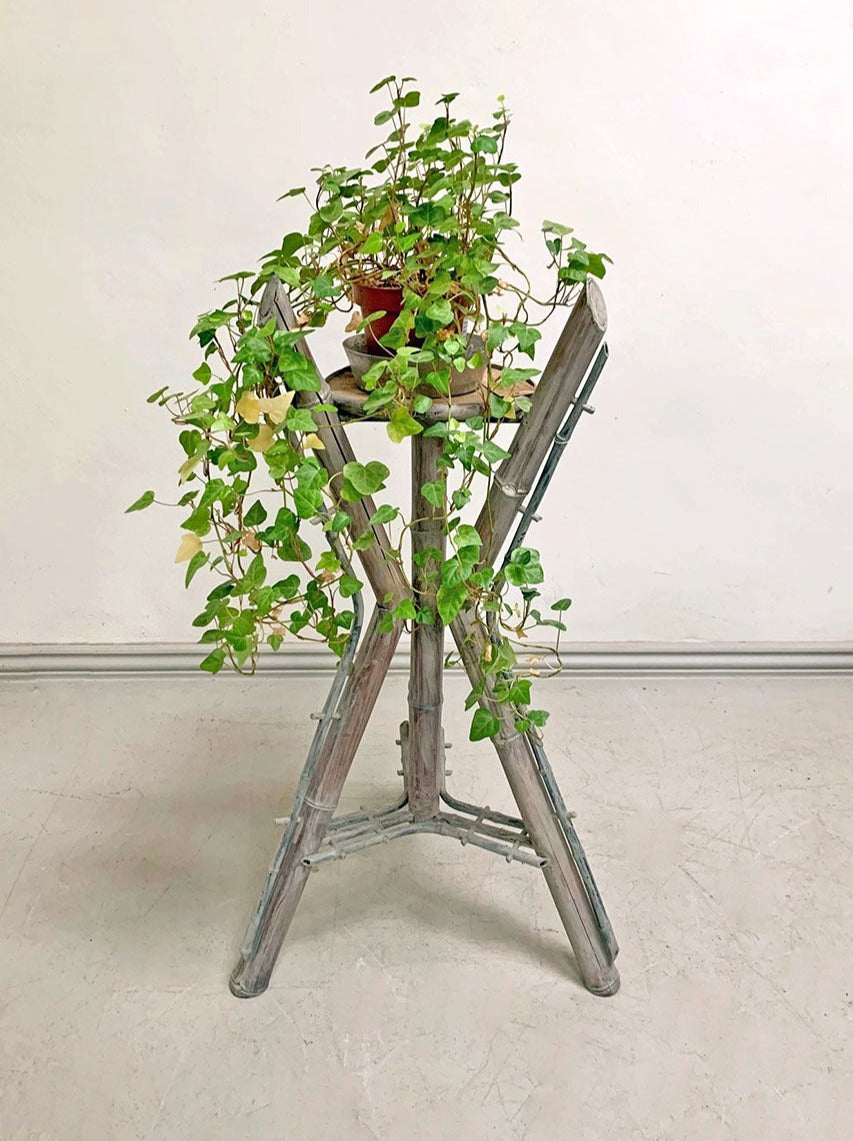 Faux bamboo plant stand