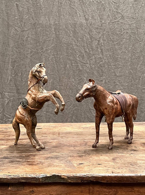 Leather horses (pair)