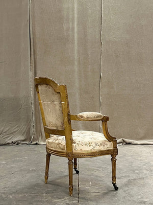 Pair of gilded armchairs